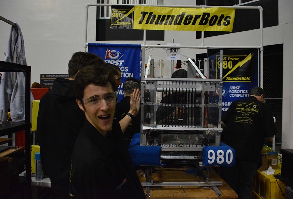 FIRST® Robotics Jacob Schlossman with robot