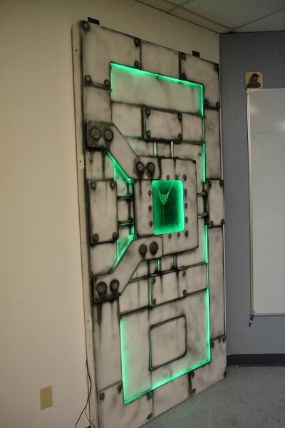 vault door with necklace in green glass