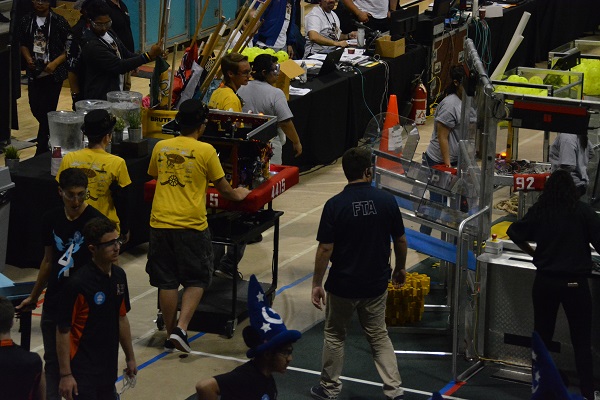 FIRST® team wheels their robot onto the field