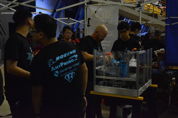 FIRST® Robotics team works on a robot