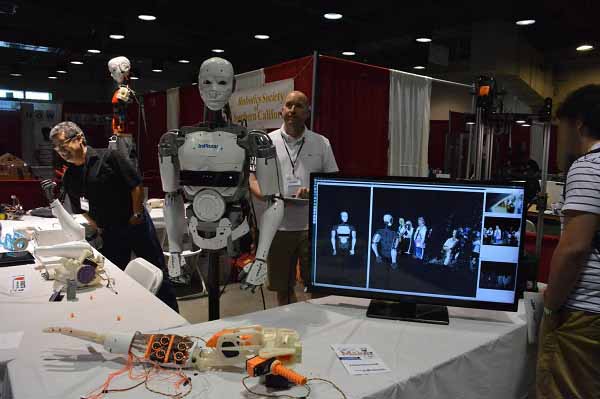 Mark Kranz and Alan Timm with InMoov robots at SoCal Maker Con.