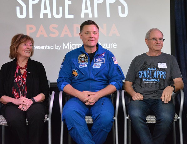 Tom Soderstrom onstage with astronaut Doug Wheelock and NASA Deputy Chief Scientist Gale Allen