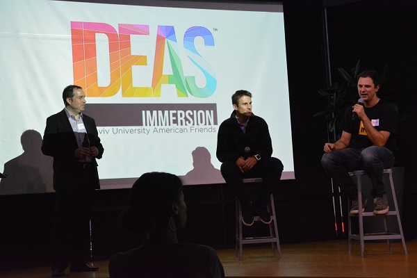 IDEAS Immersion panelists Josh Jones and Mike Townsend onstage with moderator Dave Whelan