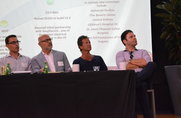 "Demo Day" panel listens to a presentation