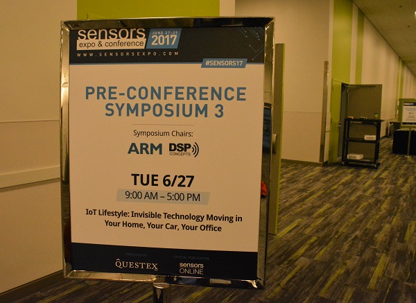 "Pre-Conference Symposium" sign in hall