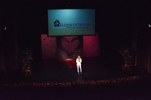 ellen K onstage with Elizabeth House slide