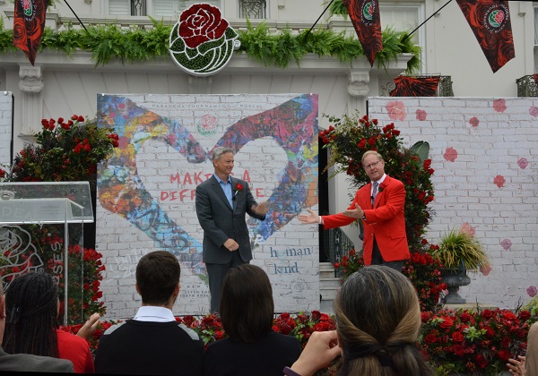 President TIbbet presents the Grand Marshal