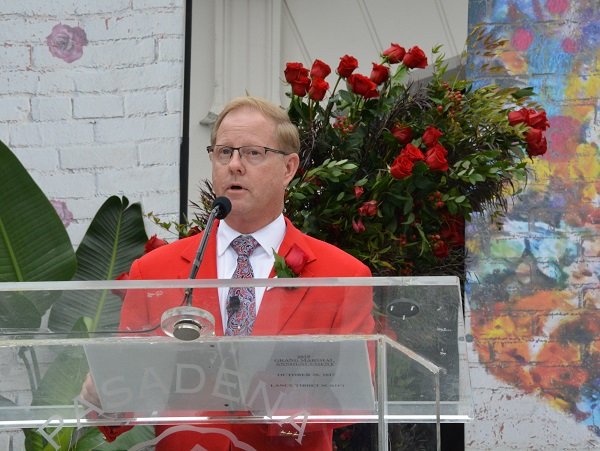 2018 Tournament of Roses President Lance Tibbet speaks from the lectern 