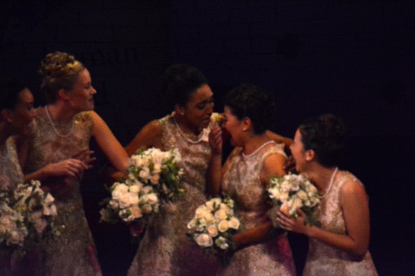 New Rose Queen®Isabella Marie Marez cries as royal Court members hug her