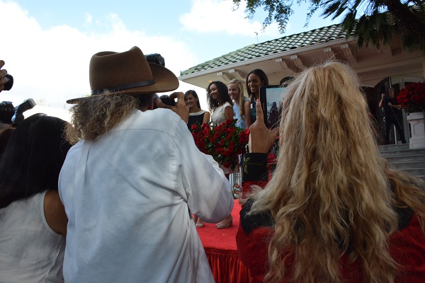 Reporters photograph the Royal Court at Tournament House