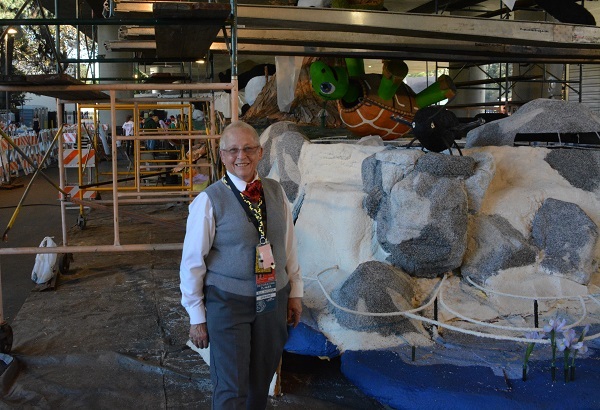 Pam Wiedenbeck stands near "Panda-Monium" float at La Canada Flintridge float barn