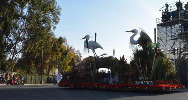 City of Torrance float turns onto Colorado Boulevard during 2018 Rose Parade