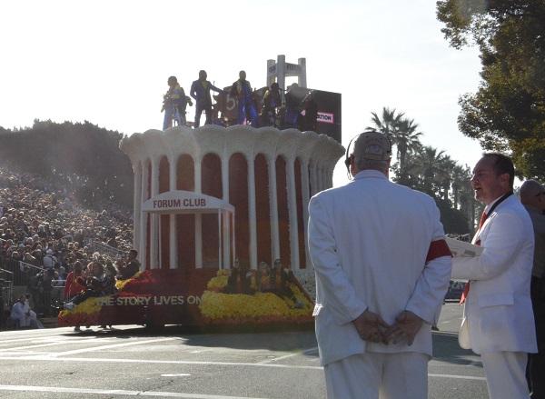 Forum Club float appears with Earth Wind and Fire and backup singers aboard with White Suiters in foreground