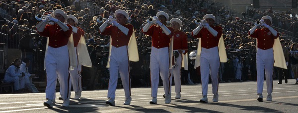 PCC Herald Trumpets announce the arrival of the 100th Rose Queen and her court