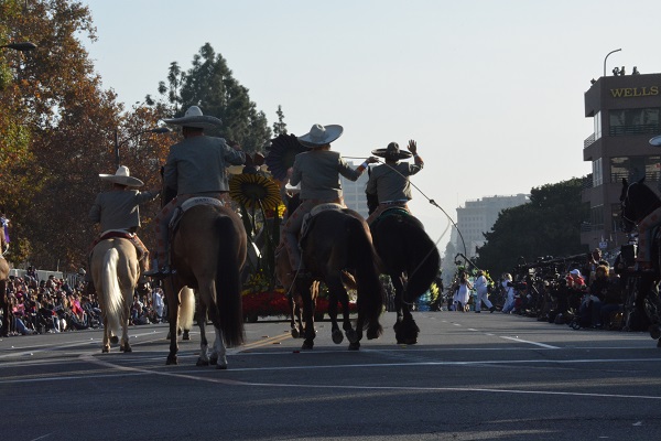 Los Hermanos Banuelos charro team emonstrate a rope trick on Colorado Boulevard