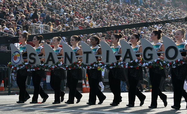 BOSS marchers with "SANTIAGO" spelled out on "shark fin" signs