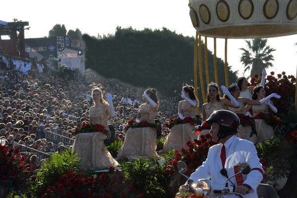 Rose Queen Isabella Marie Marez and her Royal Court wave to Rose Parade crowds