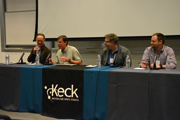 Dr. Doug Bowman and three ellow fellow panelists seated at discussion panel dais with "Keck Institute" banner