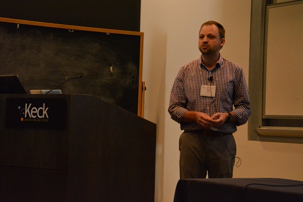 Professor Alex Endert speaks to audience from beside the Keck lectern