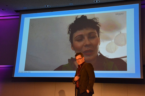 Isabela speaks from Skype screen as Dr. Keith Grimes listens