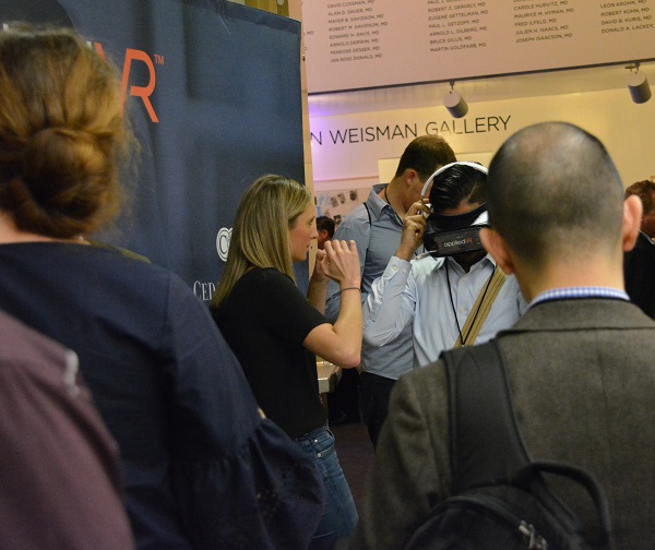 attendees try VR headsets