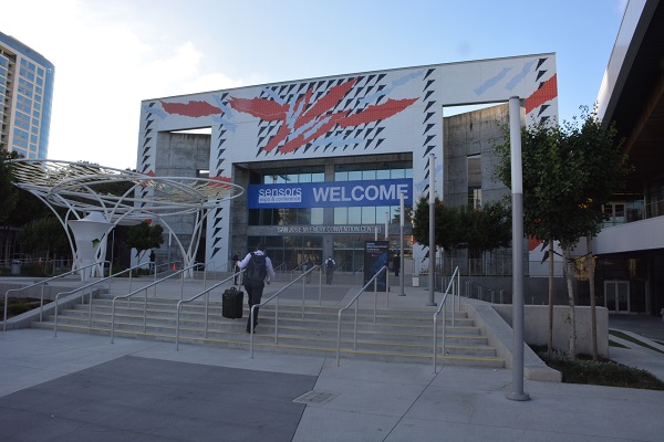 Attendees enter McEnery Convention Center with Sensors banner