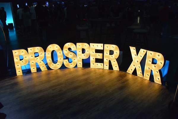 Prosper XR sign in gold lights on VRLA 2018 convention floor