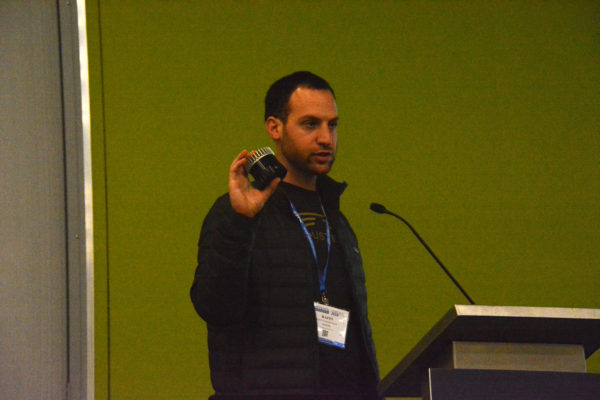 Raffi Mardrosian, of Ouster, displays his company's sensor during Autonomous Vehicles Sensors Conference 2018