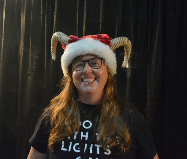 Abigail Garvin with Krampus hat at the podcast booth at ScareLA 2018