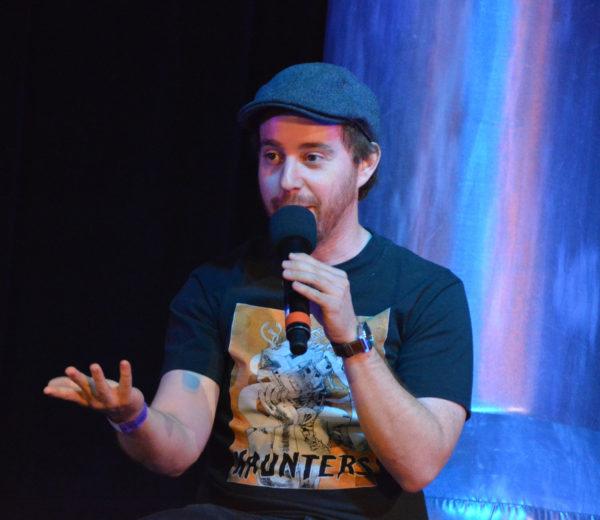 Composer Alexander Burke speaks on "Haunters" panel during ScareLA™ 2018