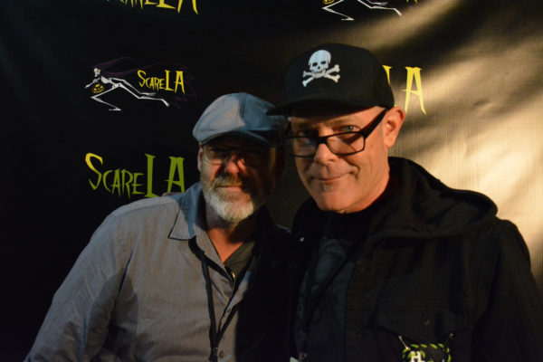 Universal Studios' Chris Williams and John Murdy strike a suitably "threatening" pose in the dark at ScareLA™ 2018