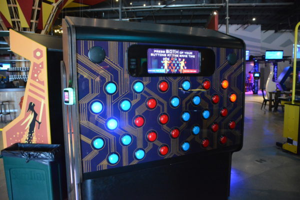 Button panel game in the middle of "Arkane" at Micro Amusement Park™