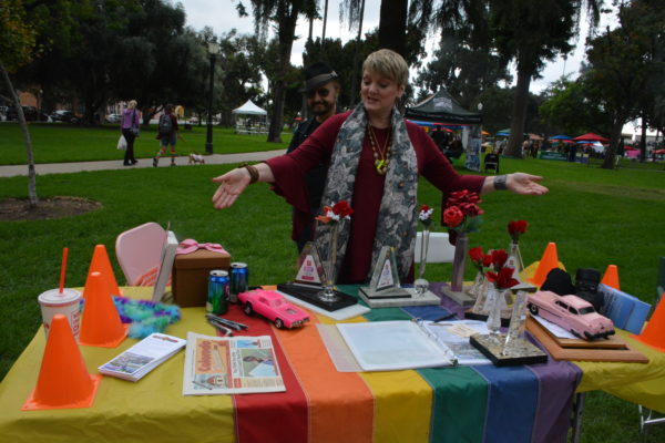 Alison Arngrm displays awards for car show at SGV Pride 2018