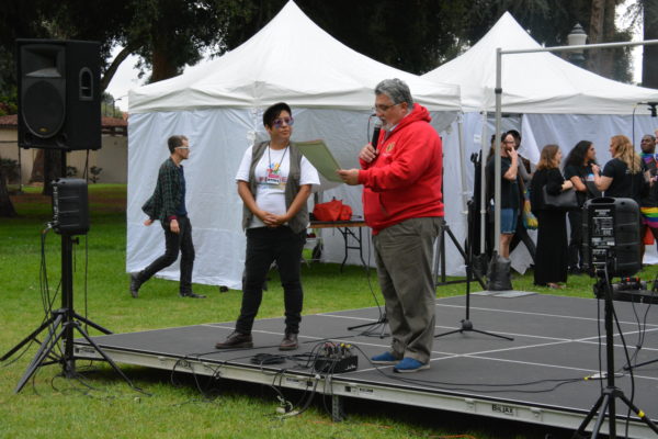 Senator Anthony Portantino hands SGV Pride President Jessica Amaya a Certificate of Recognition during SGV Pride 2018