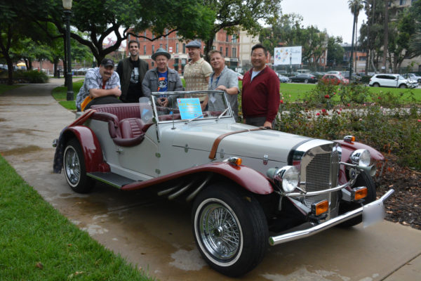 Great Autos of Yesteryear members congregate around a Belvedere at SGV Pride 2018