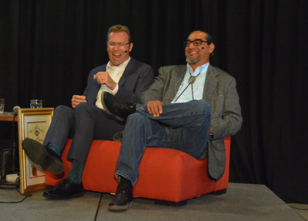 Ben Dickow and Robert Gutierez laugh during panel presentation at Toolbox L.A. Grand Opening