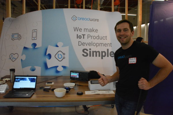 Danny D. gives a thumbs-up sign next to his Breadware exhibit at Toolbox L.A.