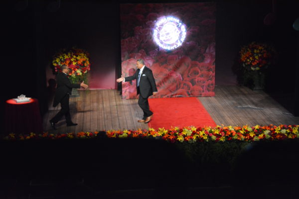 Chirs Schauble welcomes 2019 Tournament of Roses Presidnet Gerald Freeny to the stage for Rose Queen coronation