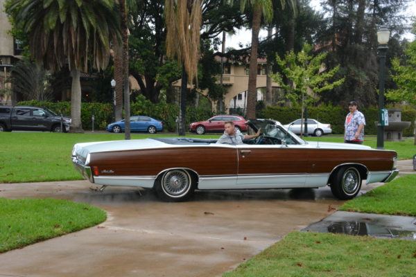 Mitch backs his 1968 Mercury convertible into Central Park for SGV Pride 2018