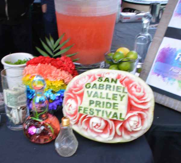 Melon carved with pink-and-white roses and "San Gabriel Valley Pride Festival" at Beer Garden of SGV Pride 2018