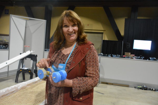 Wendy York, of Community Science Workshop Network, displays a rover at California STEAM Symposium