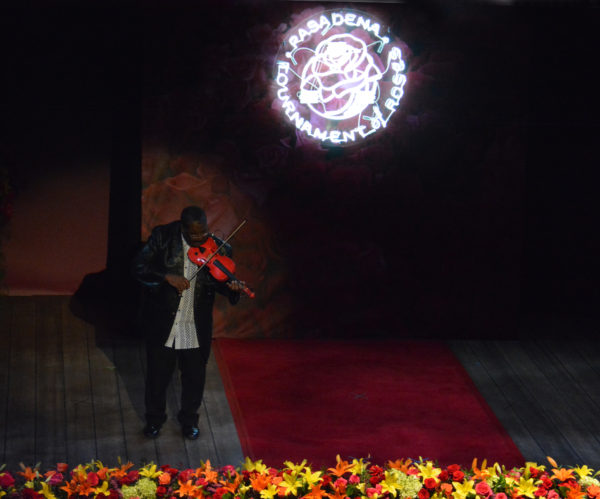 Ambiance violinist performs onstage at Rose Queen coronation ceremony