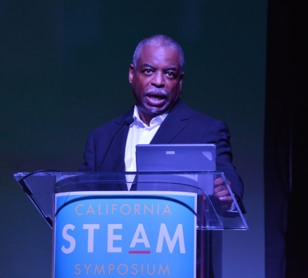 LeVar Burton speaks to the audience from the California STEAM Symposium podium