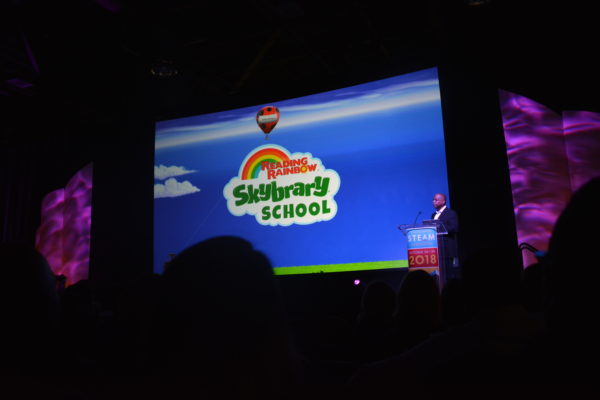 LeVar Burton at podium with "Skybrary School" slide