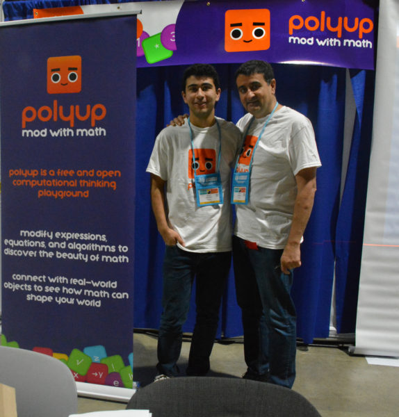 Shaya and Amir Zarkesh next to Polyup display at California STEAM Symposium