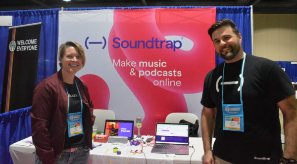 Meredith Allen and Matteo Ottaviani smile next to their Soundtrap booth at California STEAM Symposium