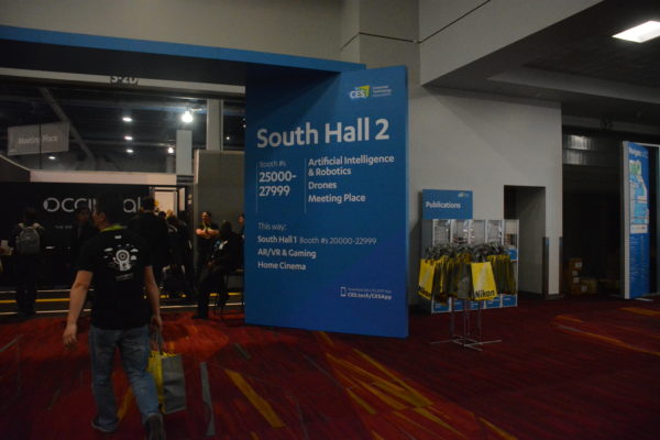 Sign reads, "South Hall 2 Artificial Intelligence and Robotics" outside open door at CES 2019 hall