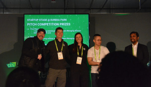 re:3d co-founder and catalyst Samantha Snabes smiles as she poses with second- and third-place winners in Techstars pitch competition.