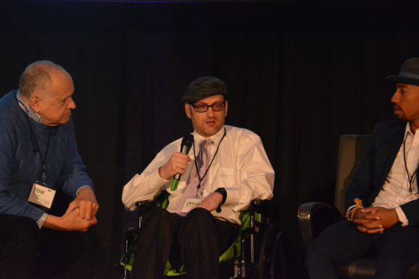 Jason Lieberman speaks as Harmon Clarke and Tom Norris listen, during Virtual Medicine Conference 2019