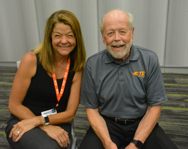 Jen Gilburg and Pete Smith of TE Connectivity smile as they pose for a picture during 2019 Sensors Expo and Conference 